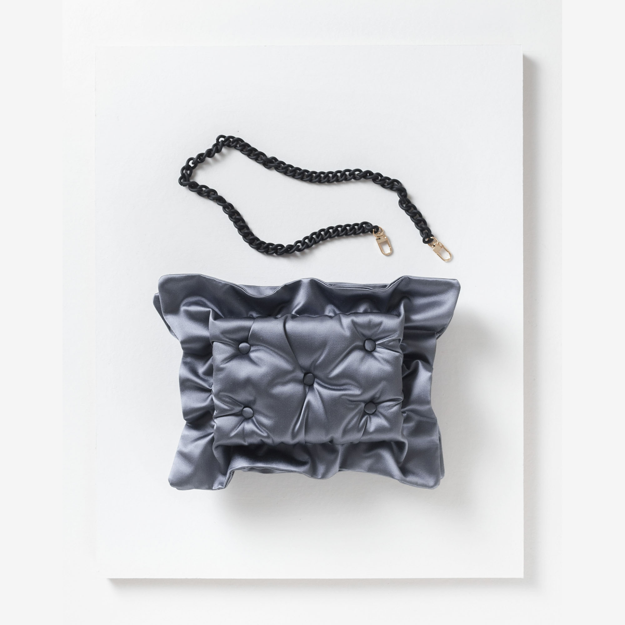 Laimushka dark grey quilted silk pillow bag with chain strap